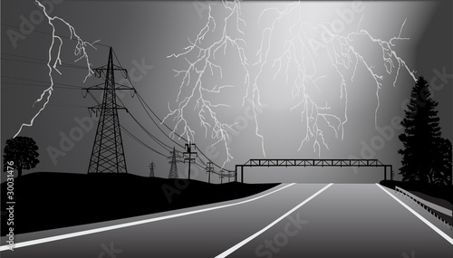 electric line and road at thunderstorm