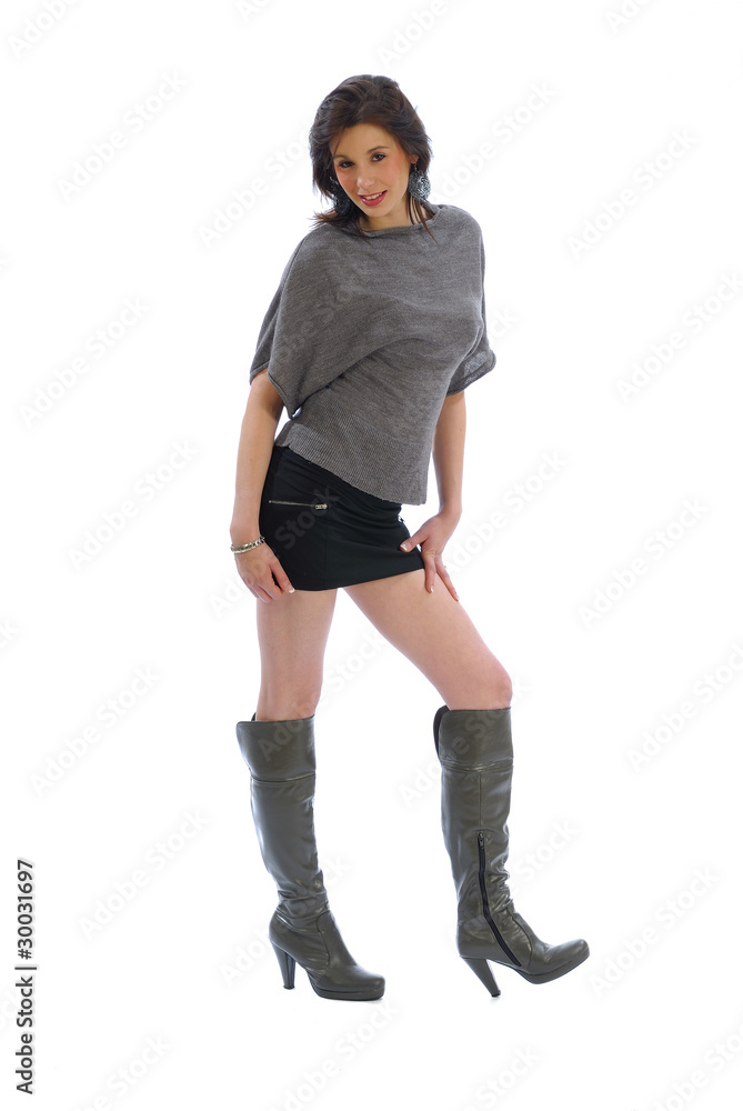 jupe courte et bottes hautes 4 Photos Adobe Stock