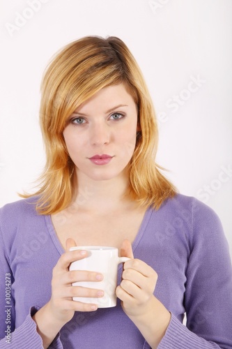 Young woman with a coffee mug