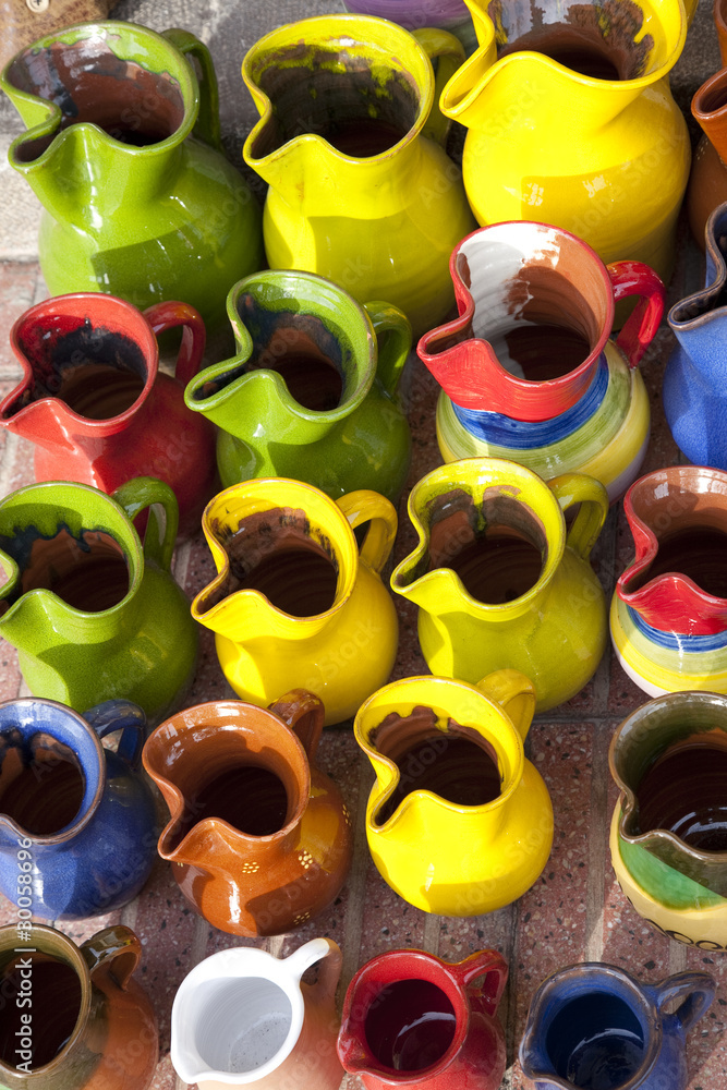 Fototapeta premium Souvenir jugs for sale outside shop in Majorca, Spain