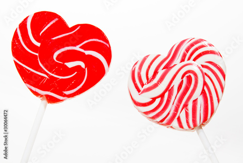 retro style red , pink heart shape lollipop
