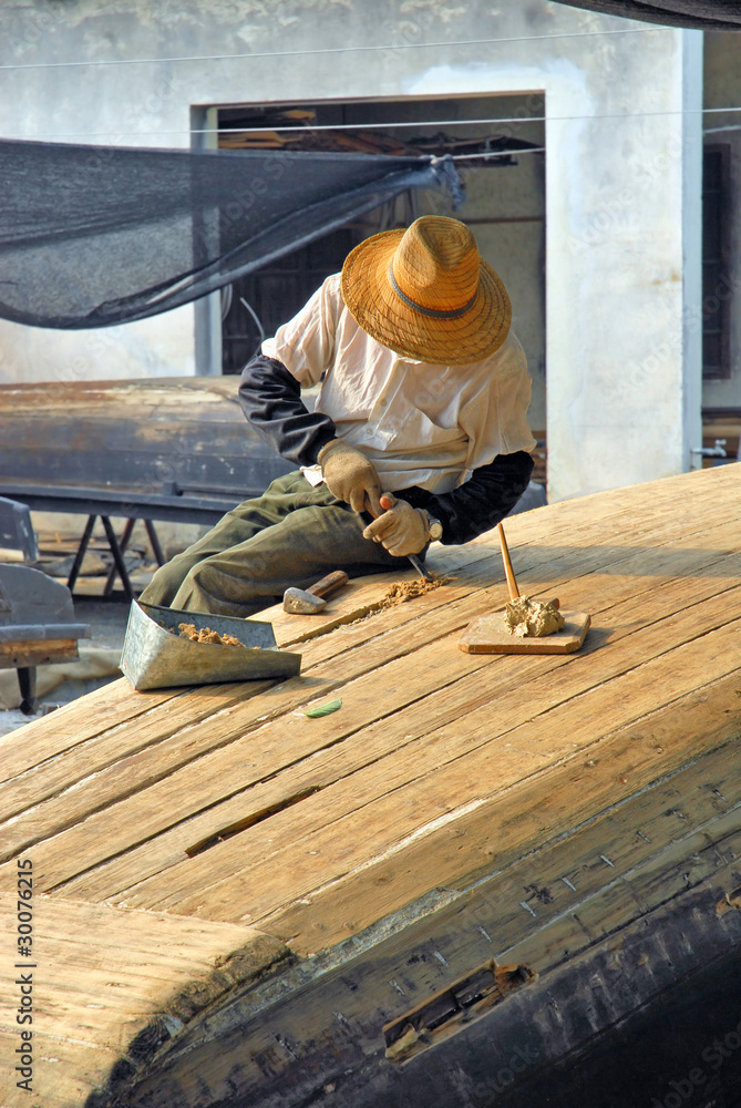 Fototapeta premium Jangsu, the Xizha old village, restoring boats