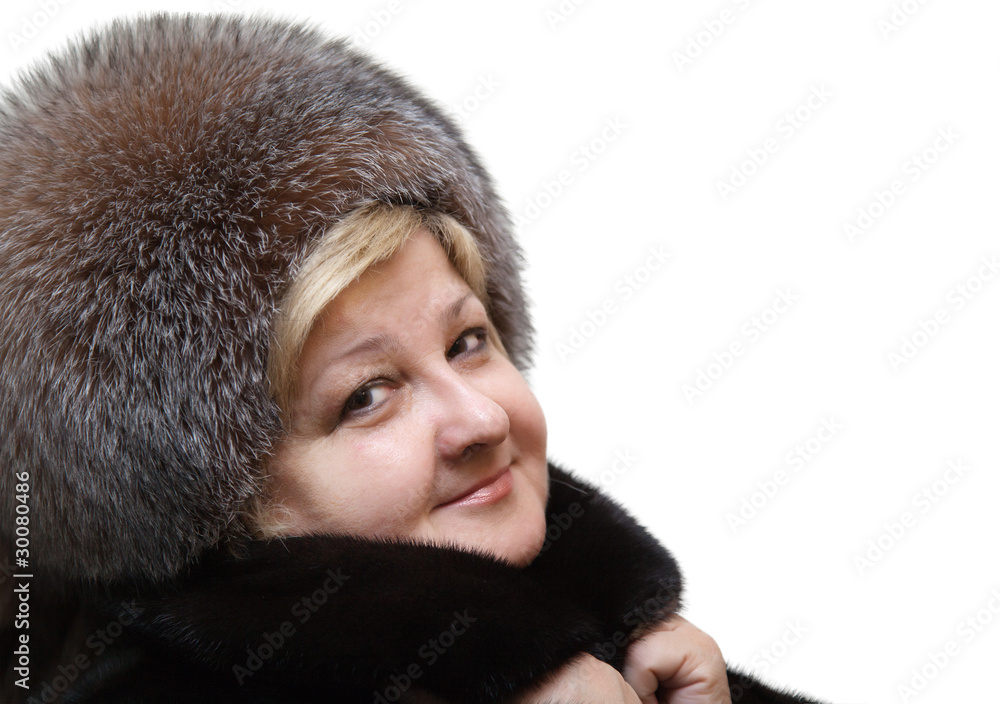 Beautiful woman wearing in fur hat and in fur coat Beautiful woman wearing in fur hat and in fur coat