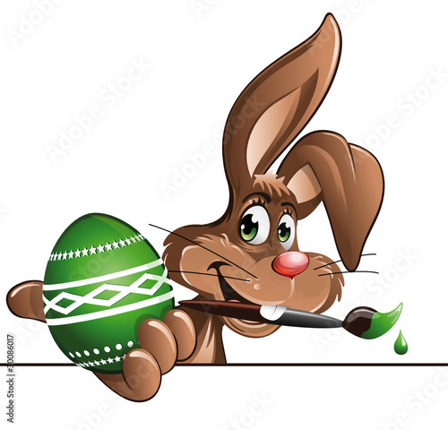 easter bunny with painted greeb egg