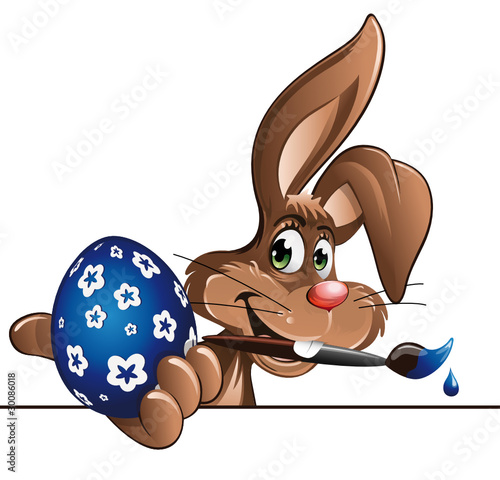 easter bunny with painted blue egg