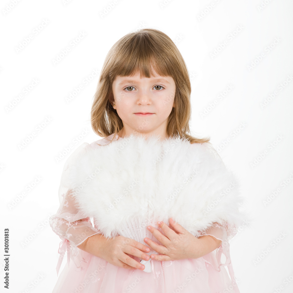 four-year girl in a beautiful pink dress with a fan. four-year girl in a beautiful pink dress with a fan.