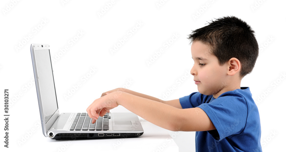 Cute child working on computer isolated on white background. Cute child working on computer isolated on white background.