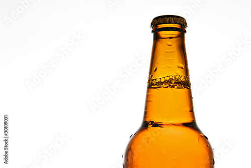 Glass of beer on white background