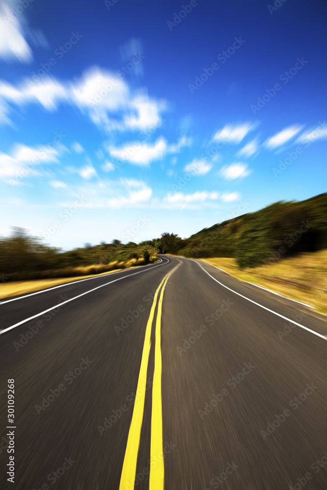 High speed road pass through the jugle with cloud background High speed road pass through the jugle with cloud background