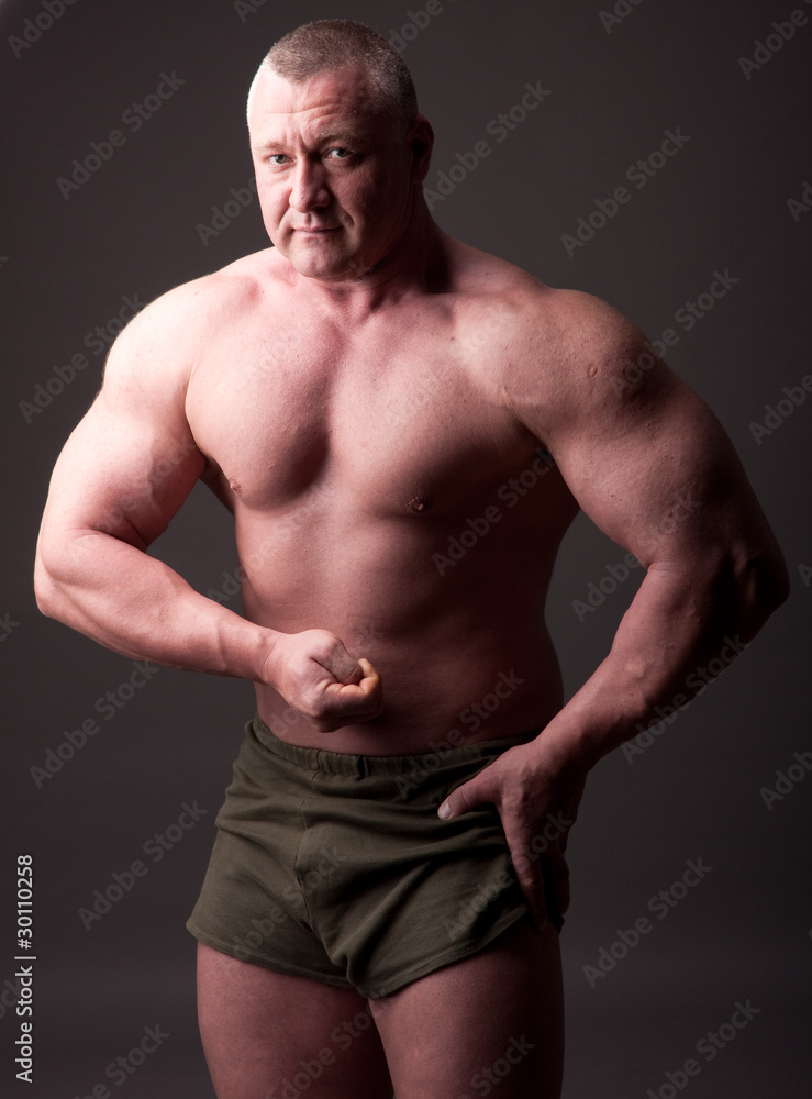 Bodybuilder posing Bodybuilder posing