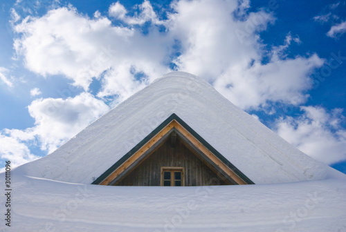 snow covered mountain cottage