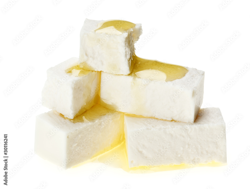 Feta cheese cubes with olive oil drops Feta cheese cubes with olive oil drops