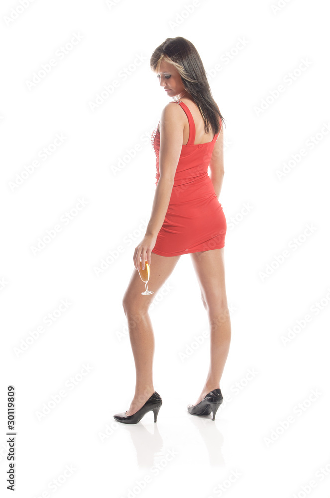 Party-Girl im roten Minikleid mit Sekt, Rückansicht Party-Girl im roten Minikleid mit Sekt, Rückansicht