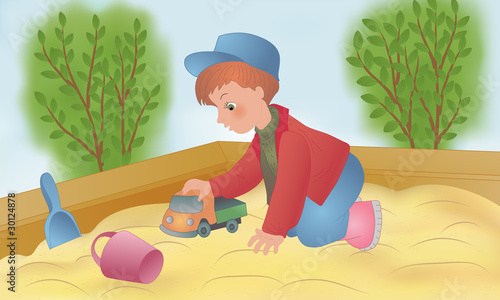 The child is played in a sandbox