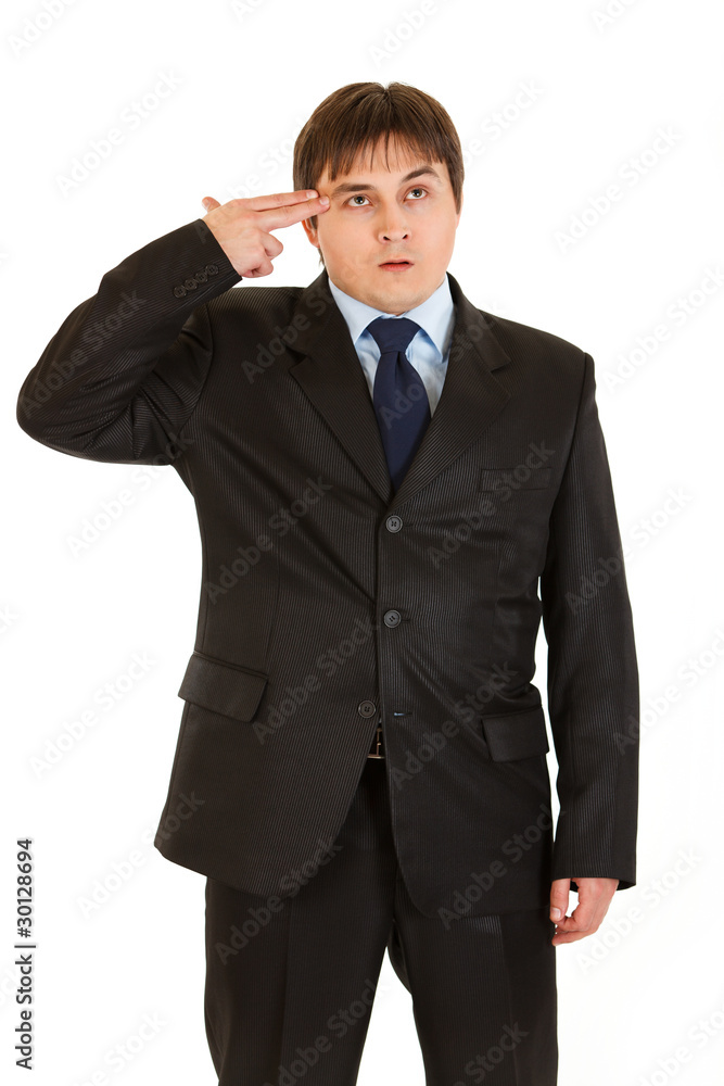 Stressed modern businessman with gun shaped hand Stressed modern businessman with gun shaped hand