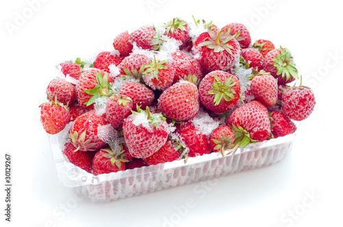 Frozen strawberries in opened box