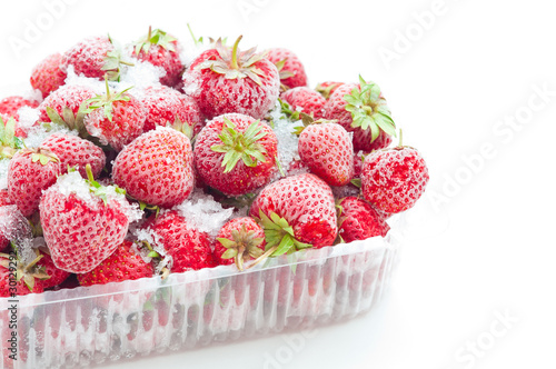 Closeup of frozen strawberries in opened box