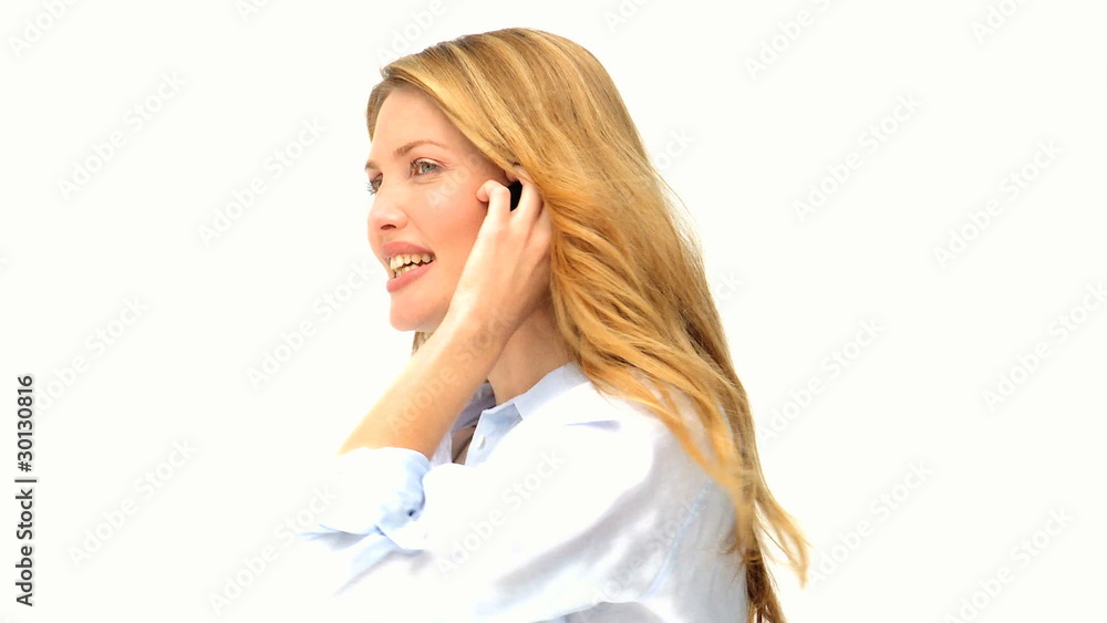 Casual blonde lady having a phone conversation Casual blonde lady having a phone conversation
