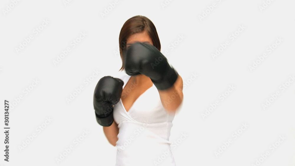 Brown-haired lady with boxing gloves Brown-haired lady with boxing gloves