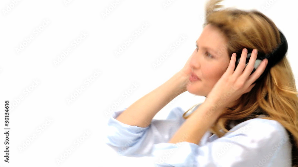 Cute blonde lady dancing with headphones Cute blonde lady dancing with headphones