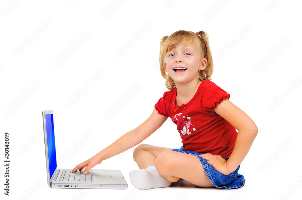 Cute little girl is dreaming with a laptop Cute little girl is dreaming with a laptop