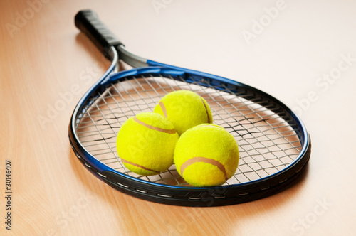 Tennis concept with balls and racket © Elnur