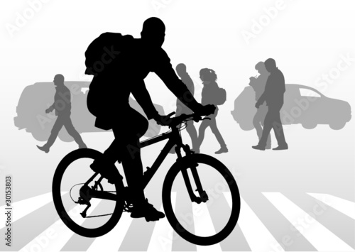 Cyclist boy on crosswalk