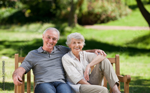 Senior couple sitting on a bench