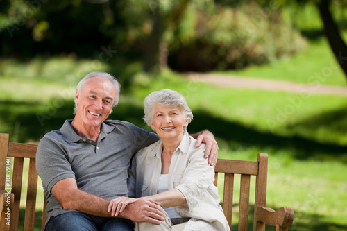 Senior couple sitting on a bench