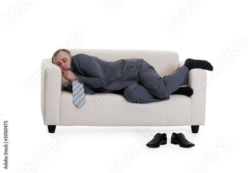 businessman sleeping on a sofa