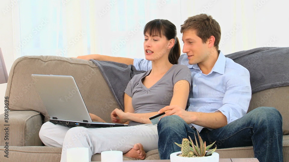 Happy couple with a laptop Happy couple with a laptop