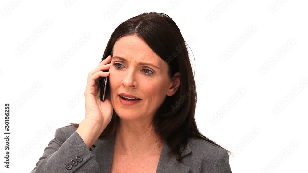 Business woman getting nervous on the phone Business woman getting nervous on the phone