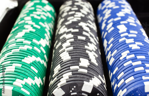 poker chips heaps in black box