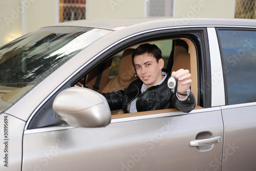 man showing the keys