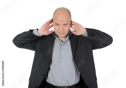 Businessman covered his ears