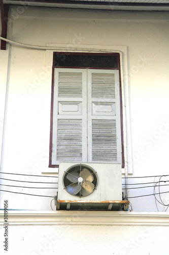 Vászonkép Old white window with air condition fan