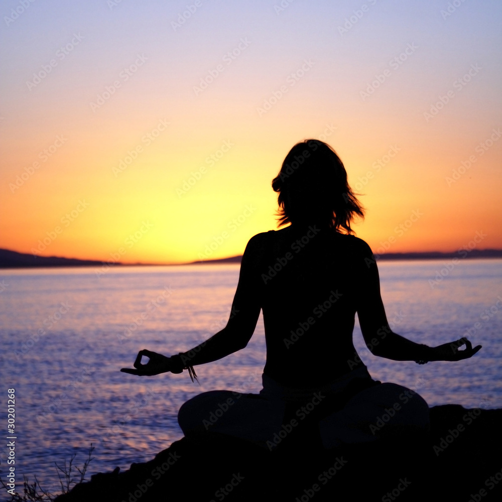 beauty girl in lotus pose on sunrise beach beauty girl in lotus pose on sunrise beach
