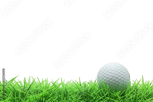 isolated golf ball on green grass over white background..