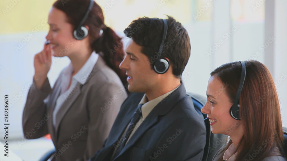 Businessteam in a call center Businessteam in a call center
