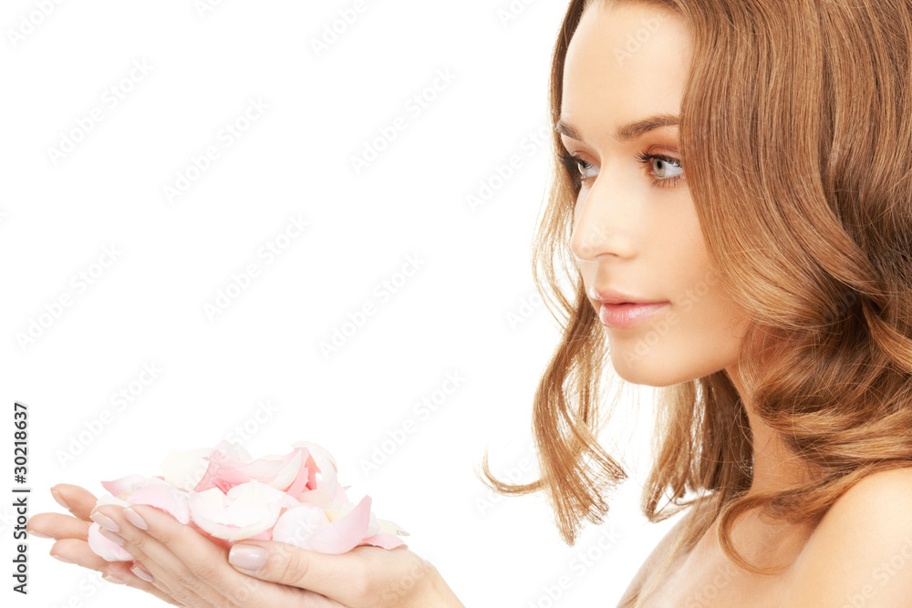 Fototapeta premium beautiful woman with rose petals