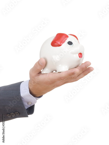 Piggy bank in business hand