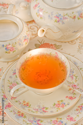 Tea cup, tea pot and sugar bowl