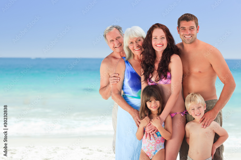 Portrait of a joyful family at the beach Portrait of a joyful family at the beach