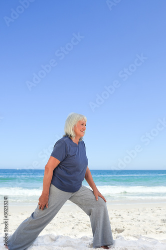 Retired woman doing her stretches