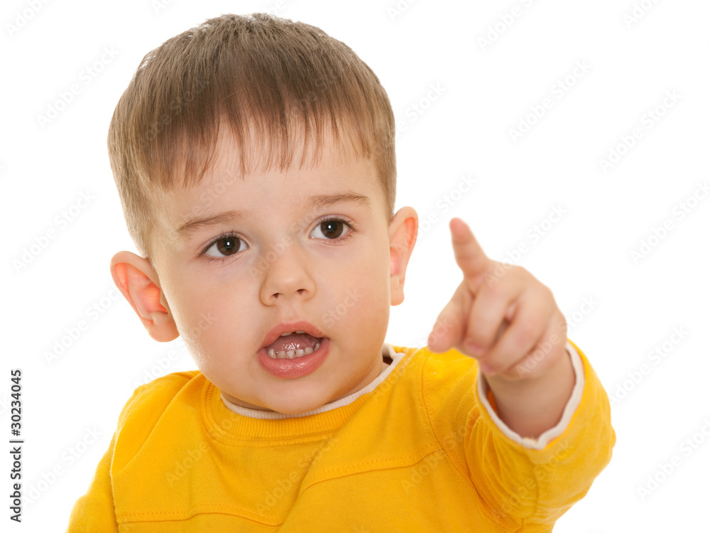 Little boy with fine haircut pointing direction Little boy with fine haircut pointing direction
