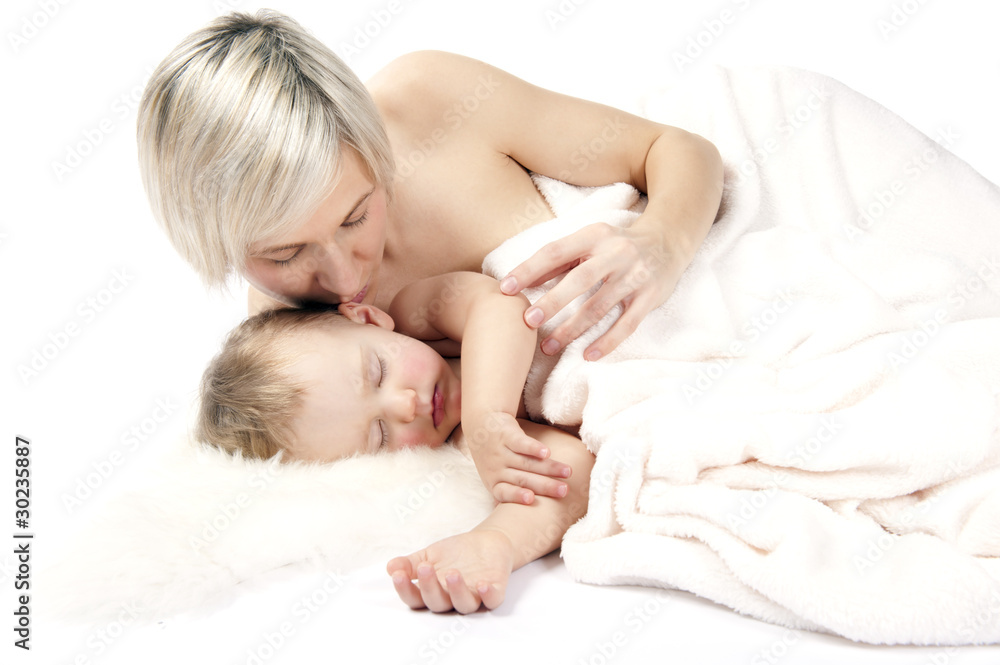 Mother with baby are sleeping in bed Mother with baby are sleeping in bed
