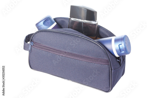 Travel toiletries bag with man`s cosmetics