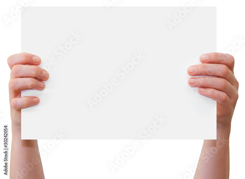 Hands upholding blank sheet of paper with copy-space