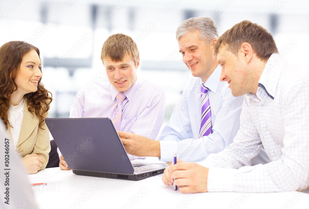 Business meeting - manager discussing work with his Business meeting - manager discussing work with his