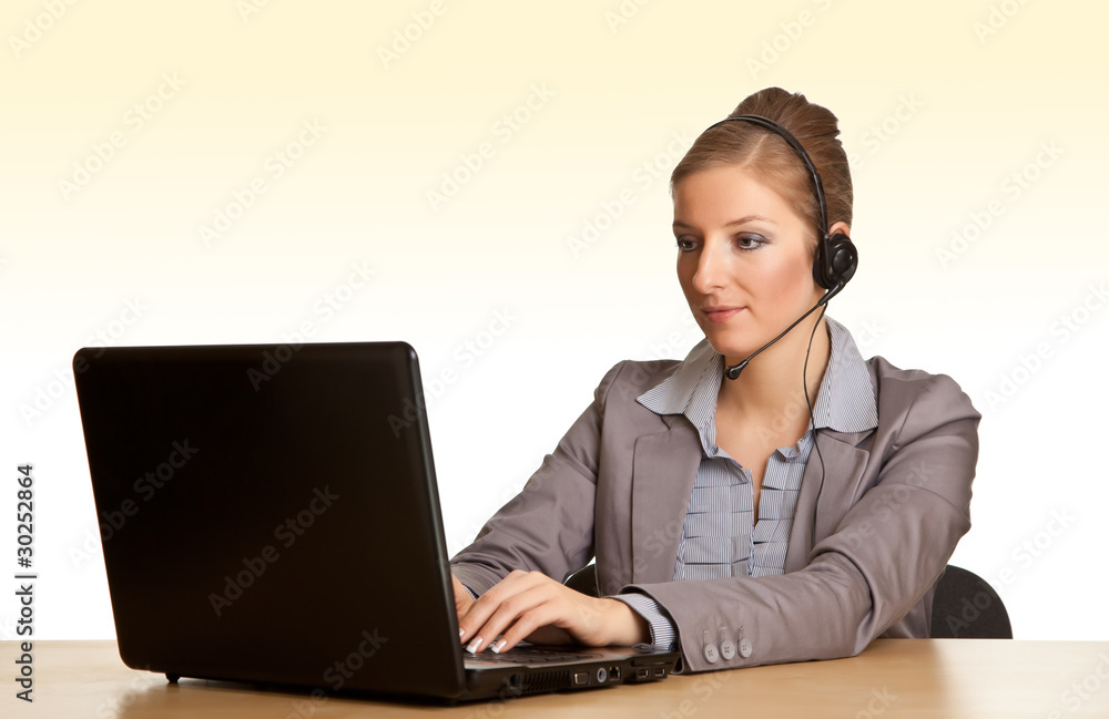 Woman in formal suit with headset isolated on white Woman in formal suit with headset isolated on white